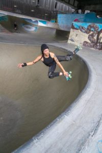 Mia skating a large bowl